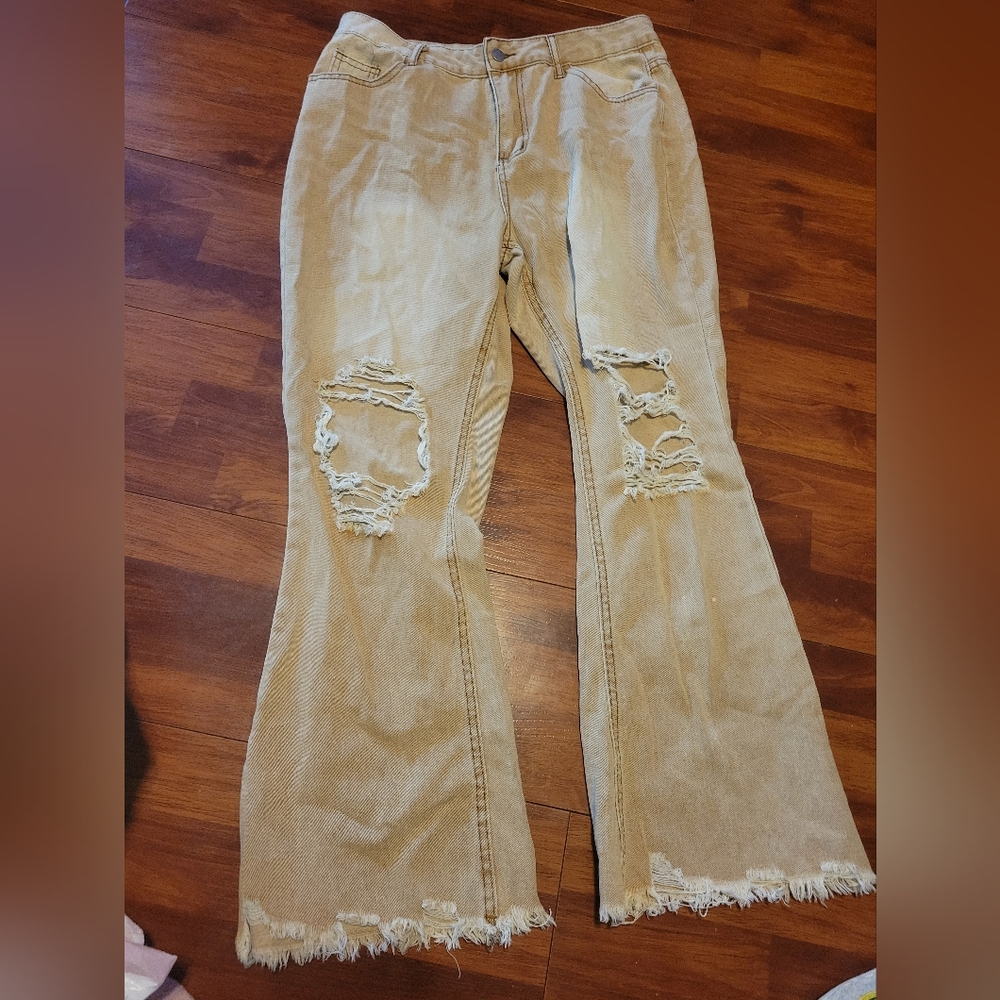 Tan colored very soft jeans. Size XL. Distressed.
